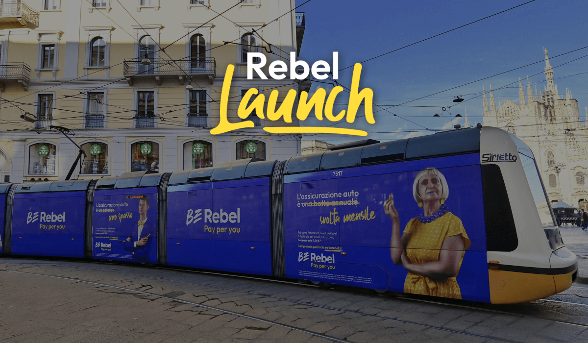 Affissione realizzata da Caffeina per BeRebel in formato "Out of Home" su un tram a Milano. Titolo "Rebel Launch" in sovraimpressione.
