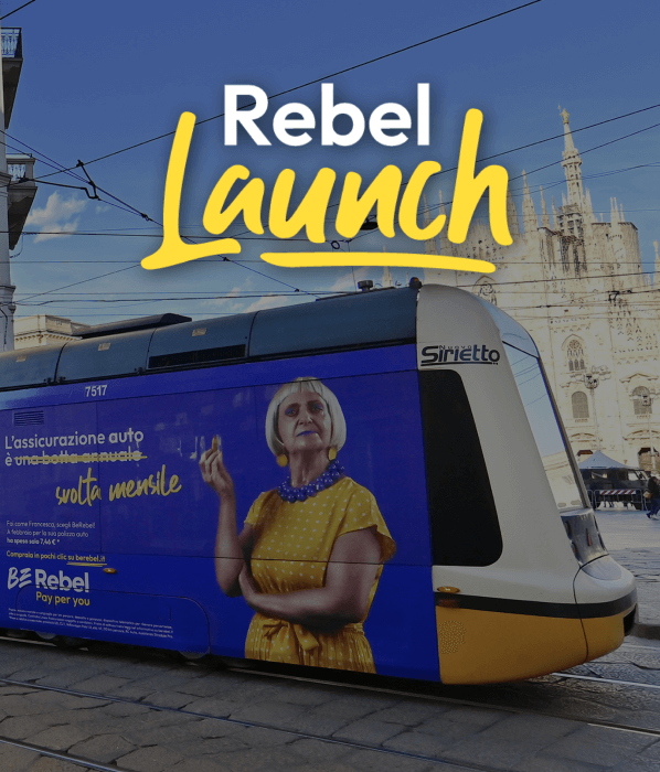 Affissione realizzata da Caffeina per BeRebel in formato "Out of Home" su un tram a Milano. Titolo "Rebel Launch" in sovraimpressione.