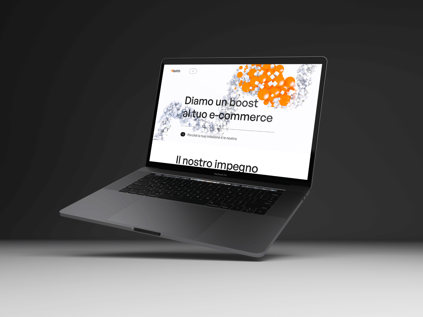 Un laptop mostra l'homepage del nuovo sito di T-Data, parte di Transmec. Realizzato da Dynamo - Caffeina.